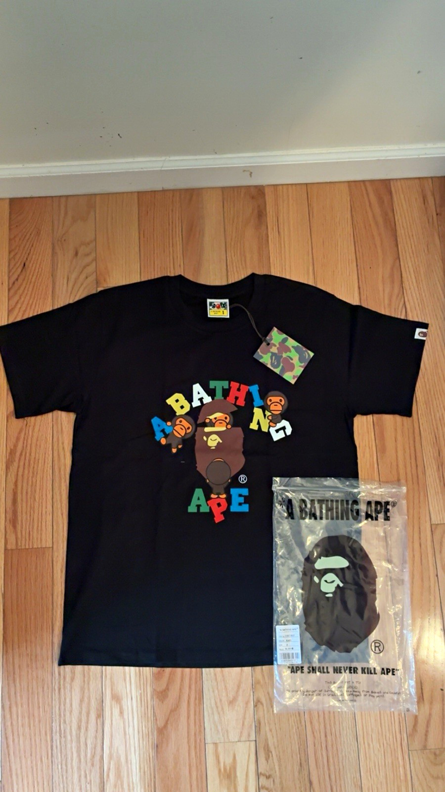 A Bathing Ape BAPE Baby Milo Graphic Logo Black Tee size small A Bathing Ape BAPE Baby Milo Graphic Logo Black Tee size small