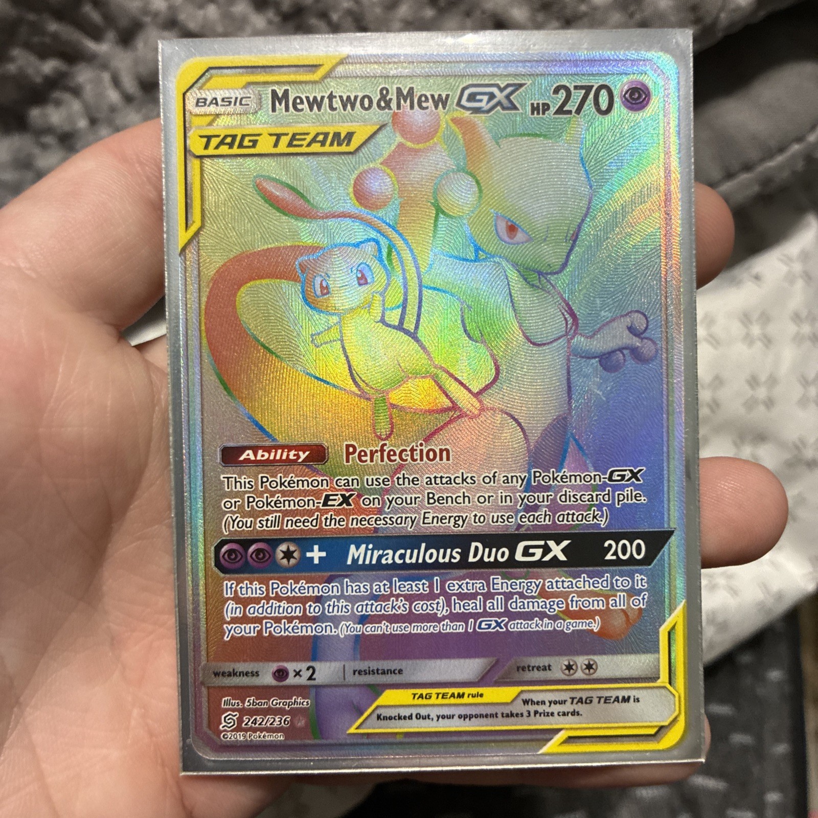 2019 Pokémon Mewtwo & Mew GX 242/236 Rainbow Rare Secret Full Art Unified Minds 2019 Pokémon Mewtwo & Mew GX 242/236 Rainbow Rare Secret Full Art Unified Minds