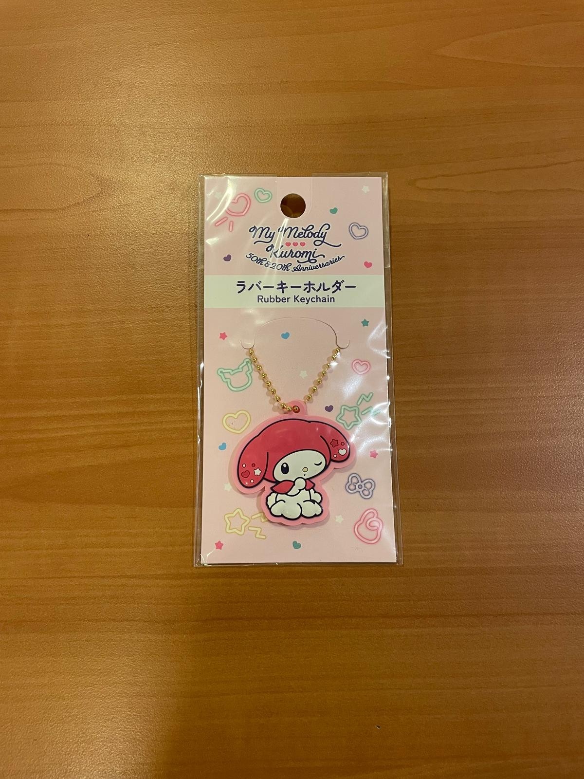Cute Sanrio My Melody mini keychain in pastel pink. Pocket-sized design