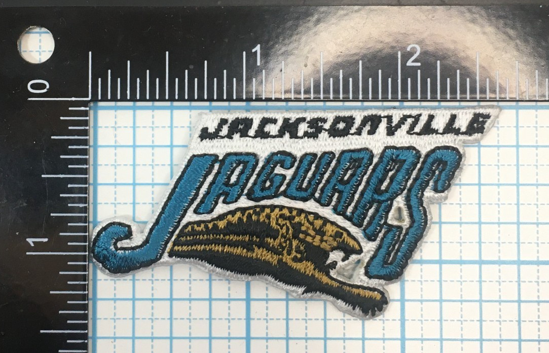 JACKSONVILLE JAGUARS NFL FOOTBALL VINTAGE 2 5/8\ JACKSONVILLE JAGUARS NFL FOOTBALL VINTAGE 2 5/8\
