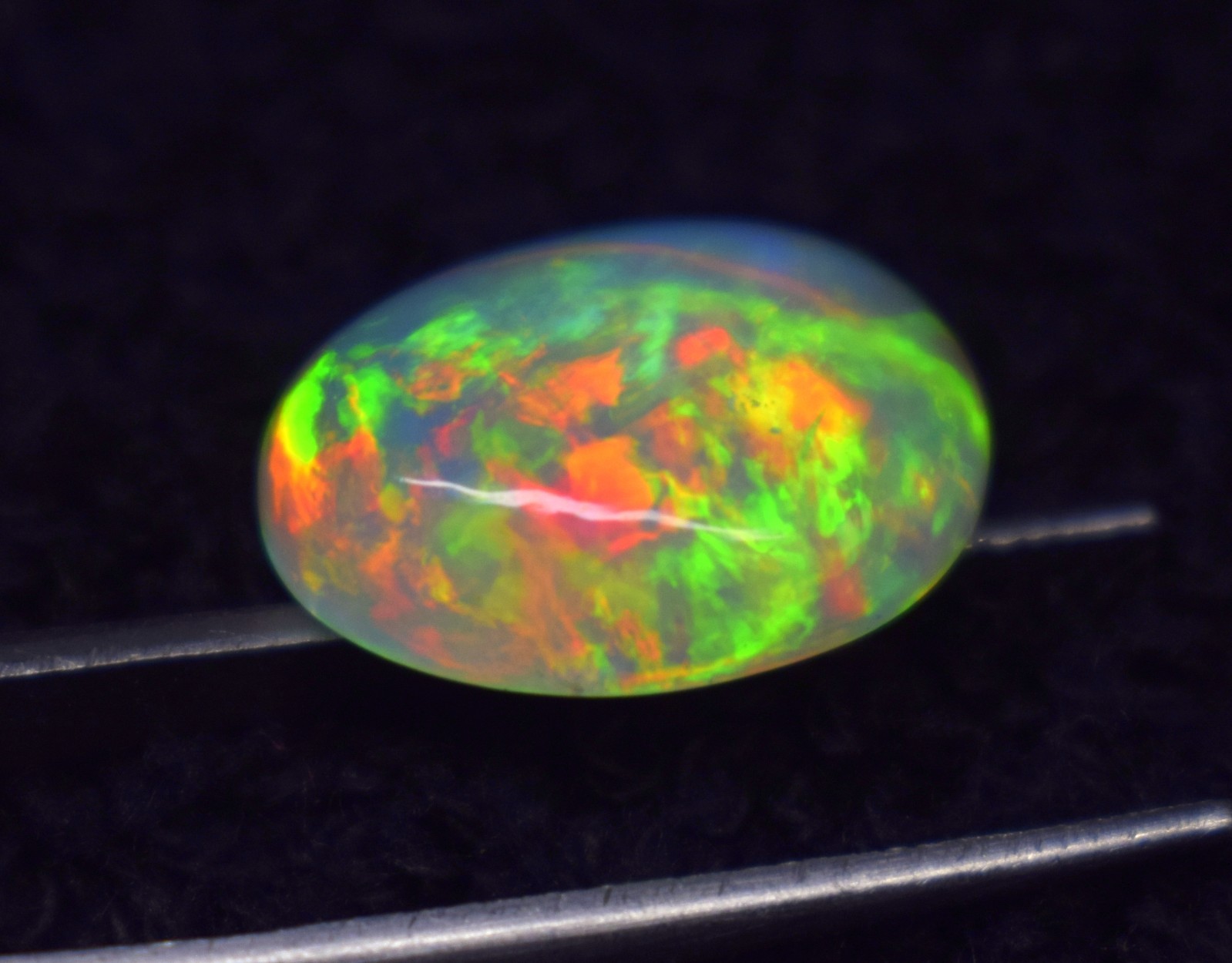 4.7 Carats Multi Fire Ethiopian Opal Cabochon Gemstone, October Birthstone 4.7 Carats Multi Fire Ethiopian Opal Cabochon Gemstone, October Birthstone