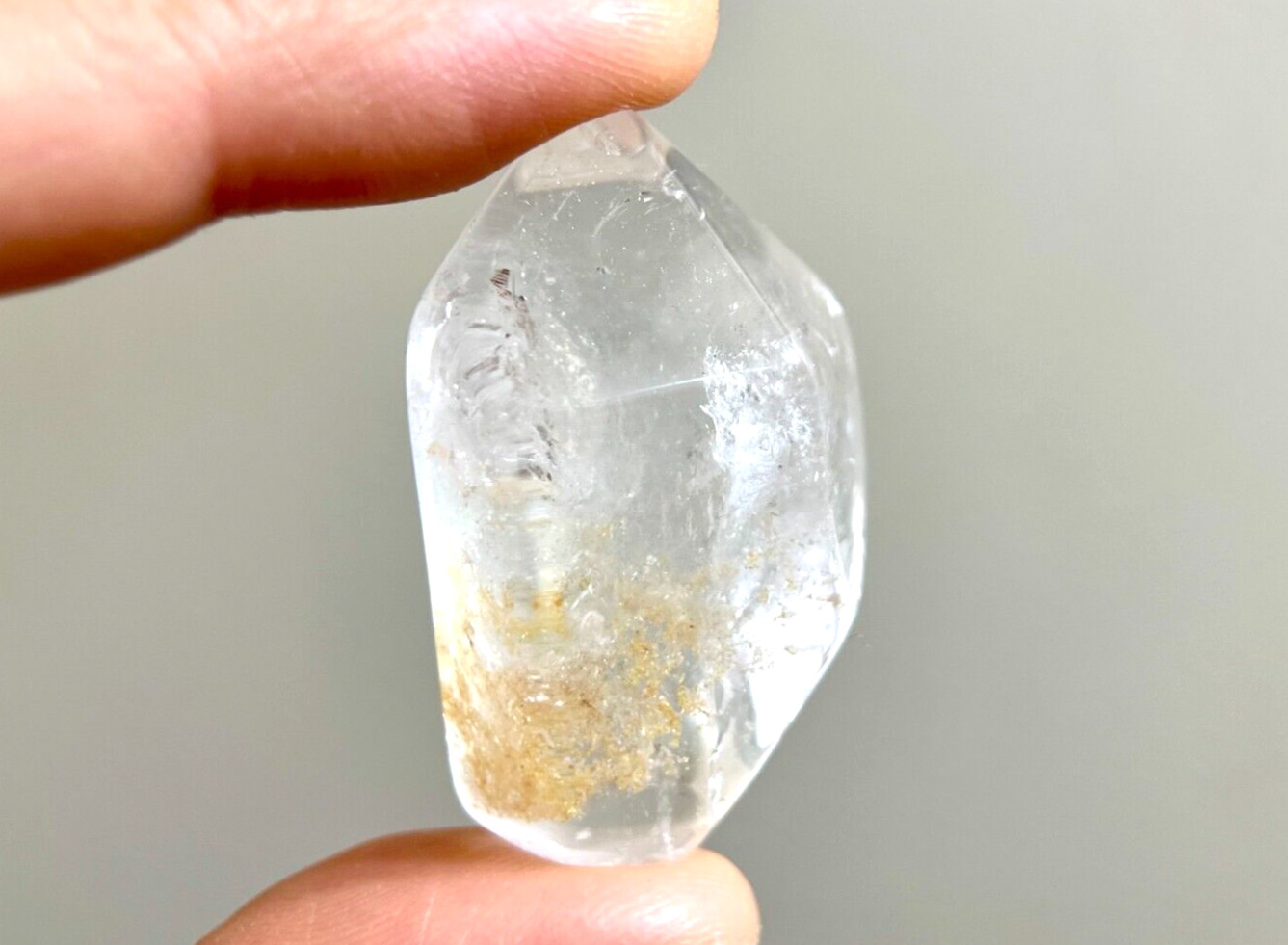 Natural phantom crystal lodolite quartz glittering golden inclusion, rainbows Natural phantom crystal lodolite quartz glittering golden inclusion, rainbows