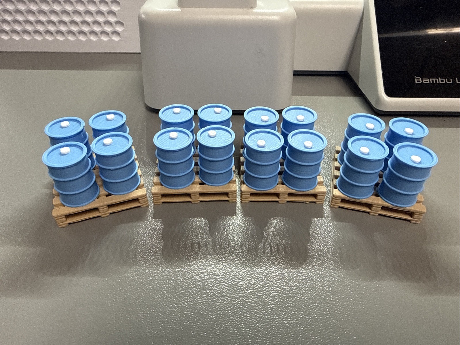 OScale Pallet O Barrels, 4 Pallets And 16 Barrels. Blue OScale Pallet O Barrels, 4 Pallets And 16 Barrels. Blue