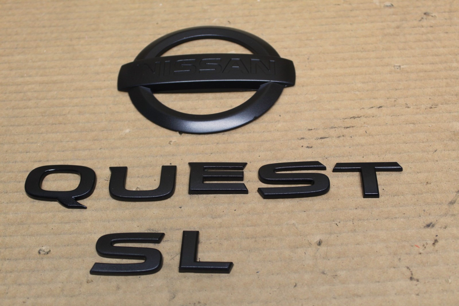 2011 - 2017 NISSAN QUEST EMBLEM LOGO OEM 2011 - 2017 NISSAN QUEST EMBLEM LOGO OEM