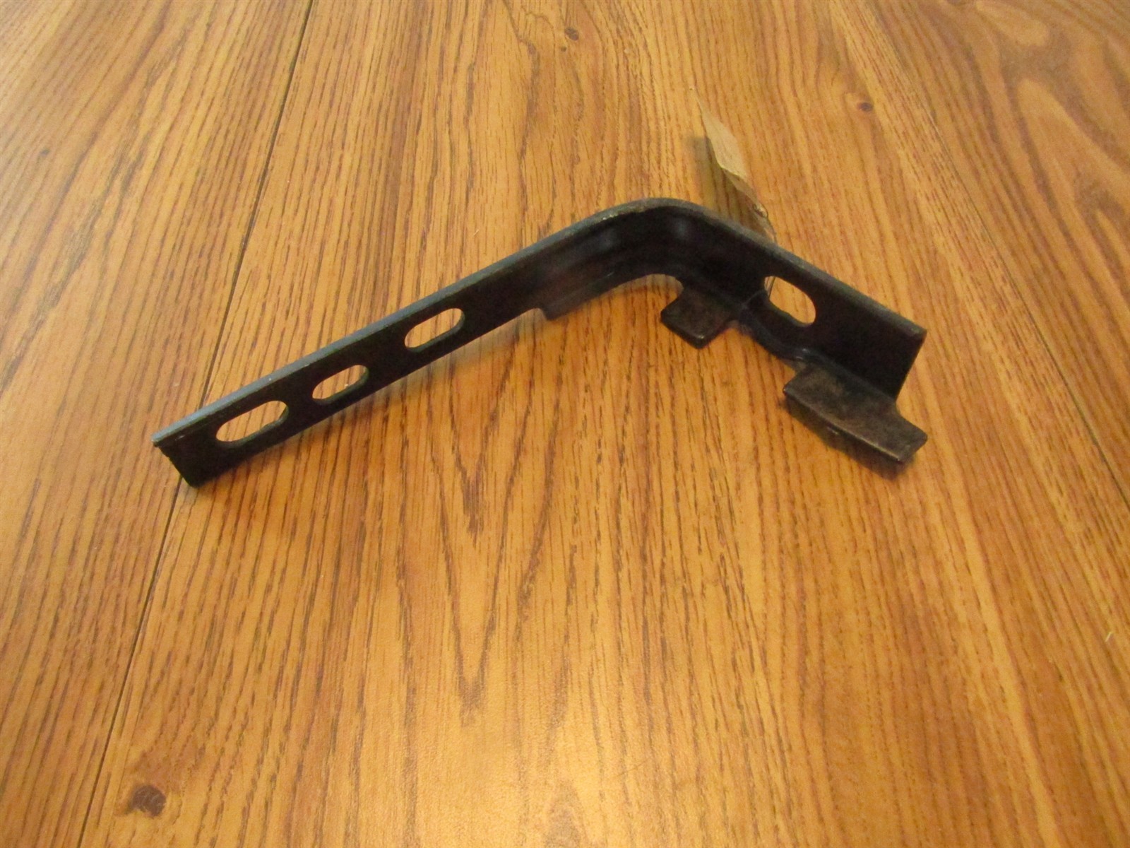 NOS 1973 FORD MAVERICK FRONT BUMPER END BRACE MOUNTING BRACKET LH 1973 ONLY