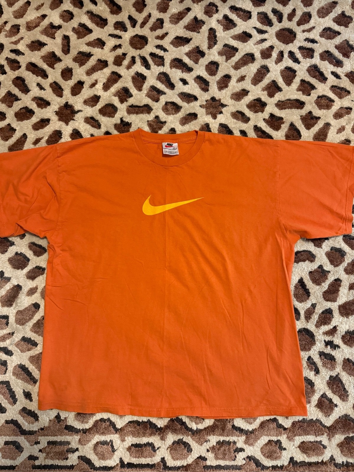 Orange Vintage Nike tee with yellow swoosh nike Orange Vintage Nike tee with yellow swoosh nike