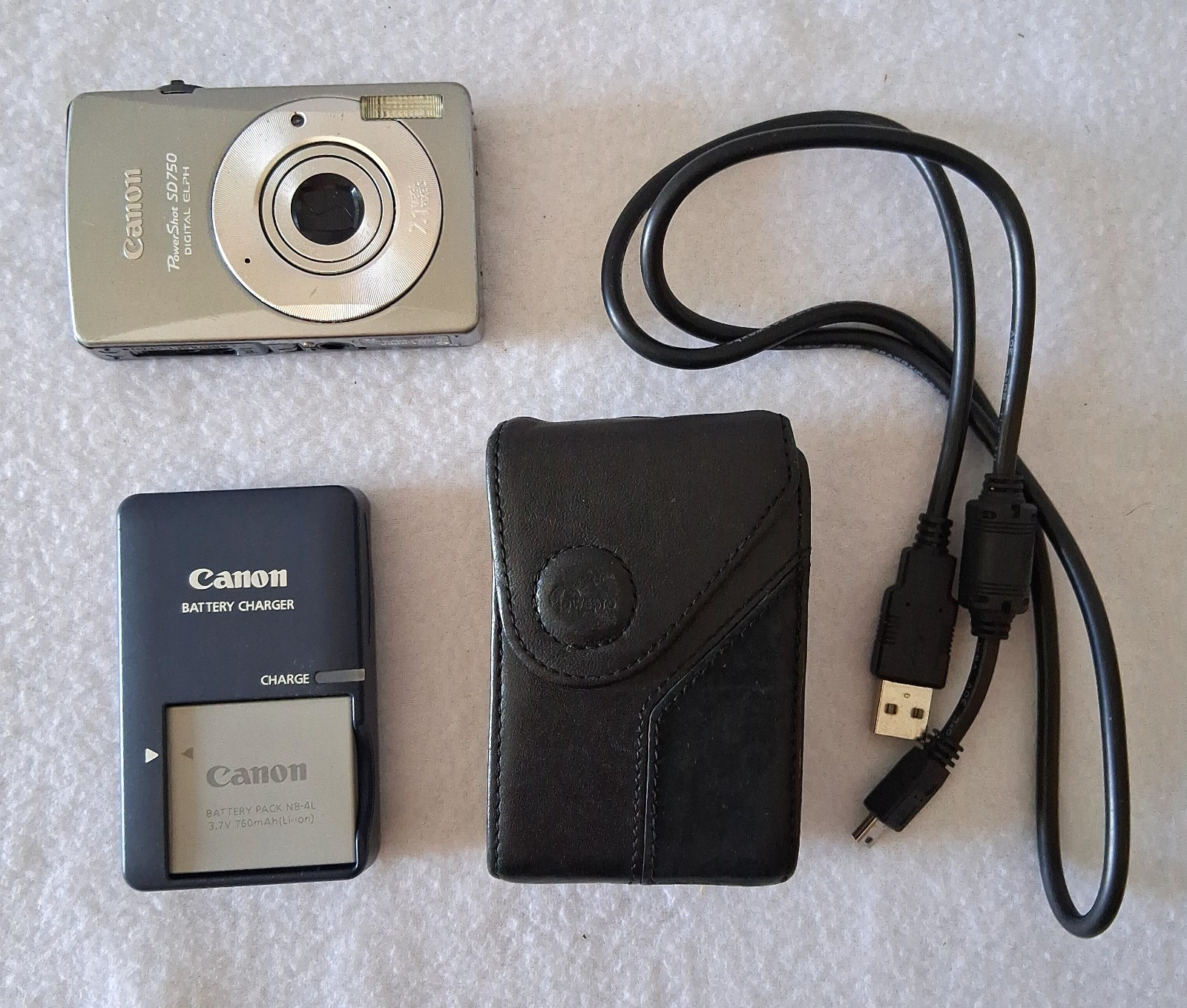 Canon PowerShot Digital ELPH SD750 7.1MP Camera, Charger, Battery, Bag, AV Cord Canon PowerShot Digital ELPH SD750 7.1MP Camera, Charger, Battery, Bag, AV Cord