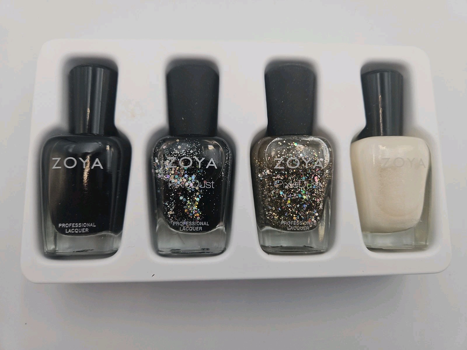 Zoya Nail Polish Quads. Winter WISHES, Four Bottles. Perfect Holiday Gifts. Zoya Nail Polish Quads. Winter WISHES, Four Bottles. Perfect Holiday Gifts.