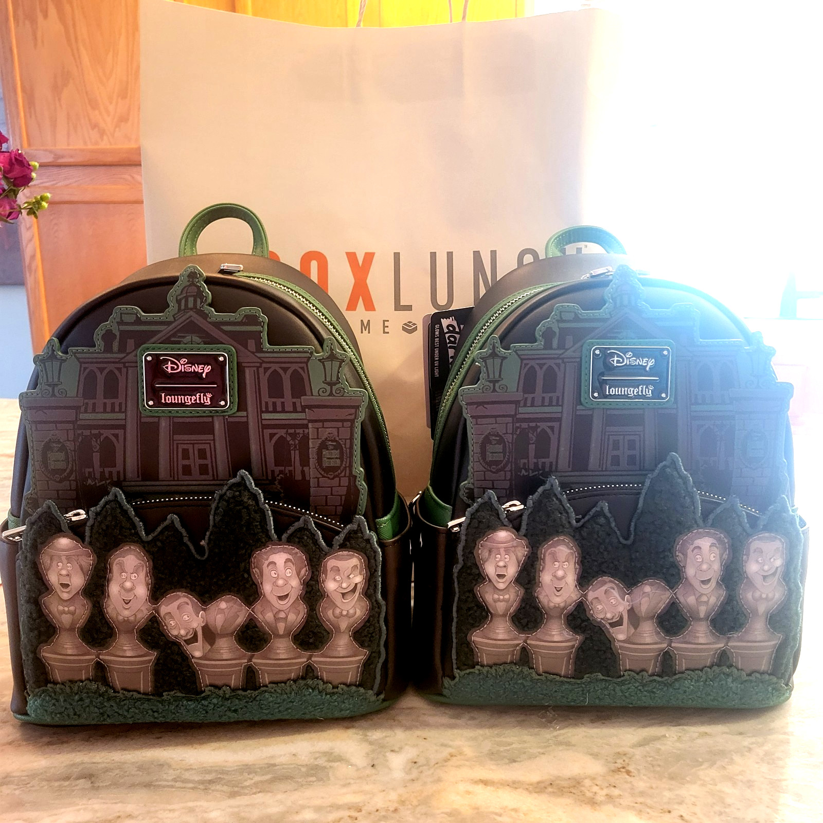 LOUNGEFLY THE HAUNTED MANSION SINGING BUSTS GITD LENTICULAR GLOW MINI BACKPACK