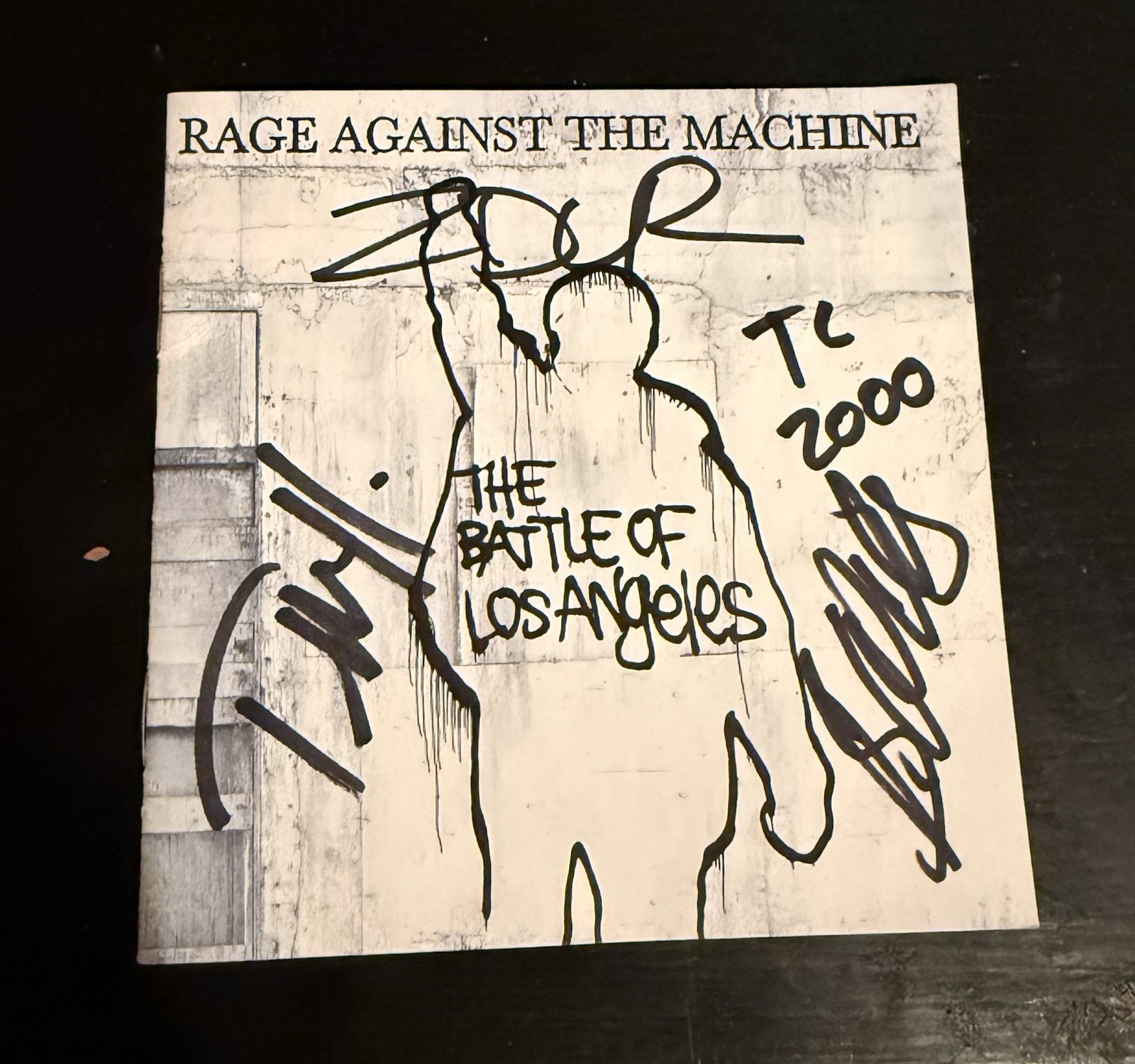 Rage Against the Machine The Battle of Los Angeles Signed Original booklet. Rage Against the Machine The Battle of Los Angeles Signed Original booklet.