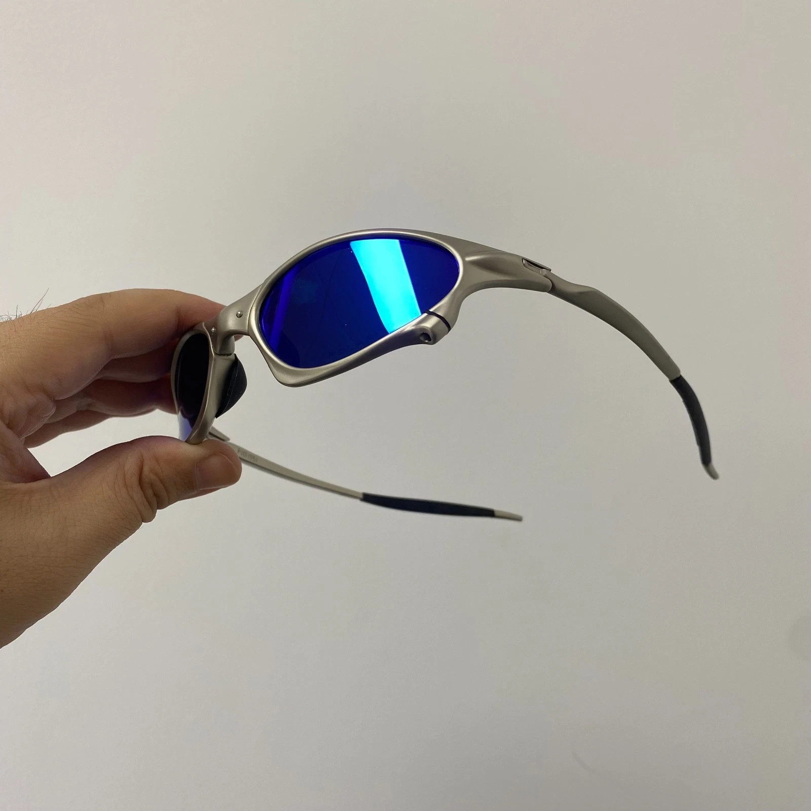 Oakley Penny X-Mental Retro Sunglasses Silver Frame/Blue Lens Brand New Oakley Penny X-Mental Retro Sunglasses Silver Frame/Blue Lens Brand New
