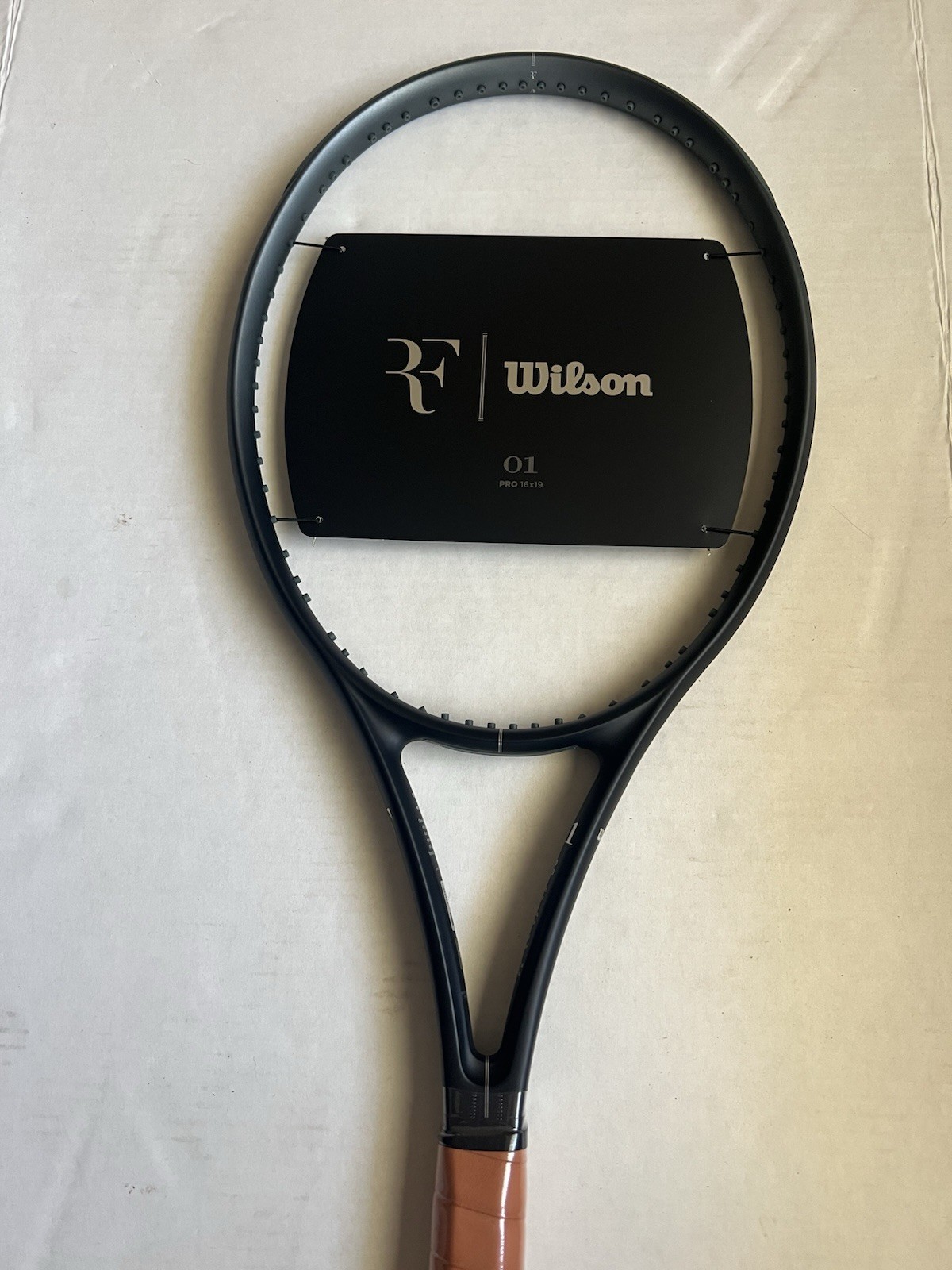 Wilson RF 01 PRO 4 3/8 Grip New Unstrung Wilson RF 01 PRO 4 3/8 Grip New Unstrung