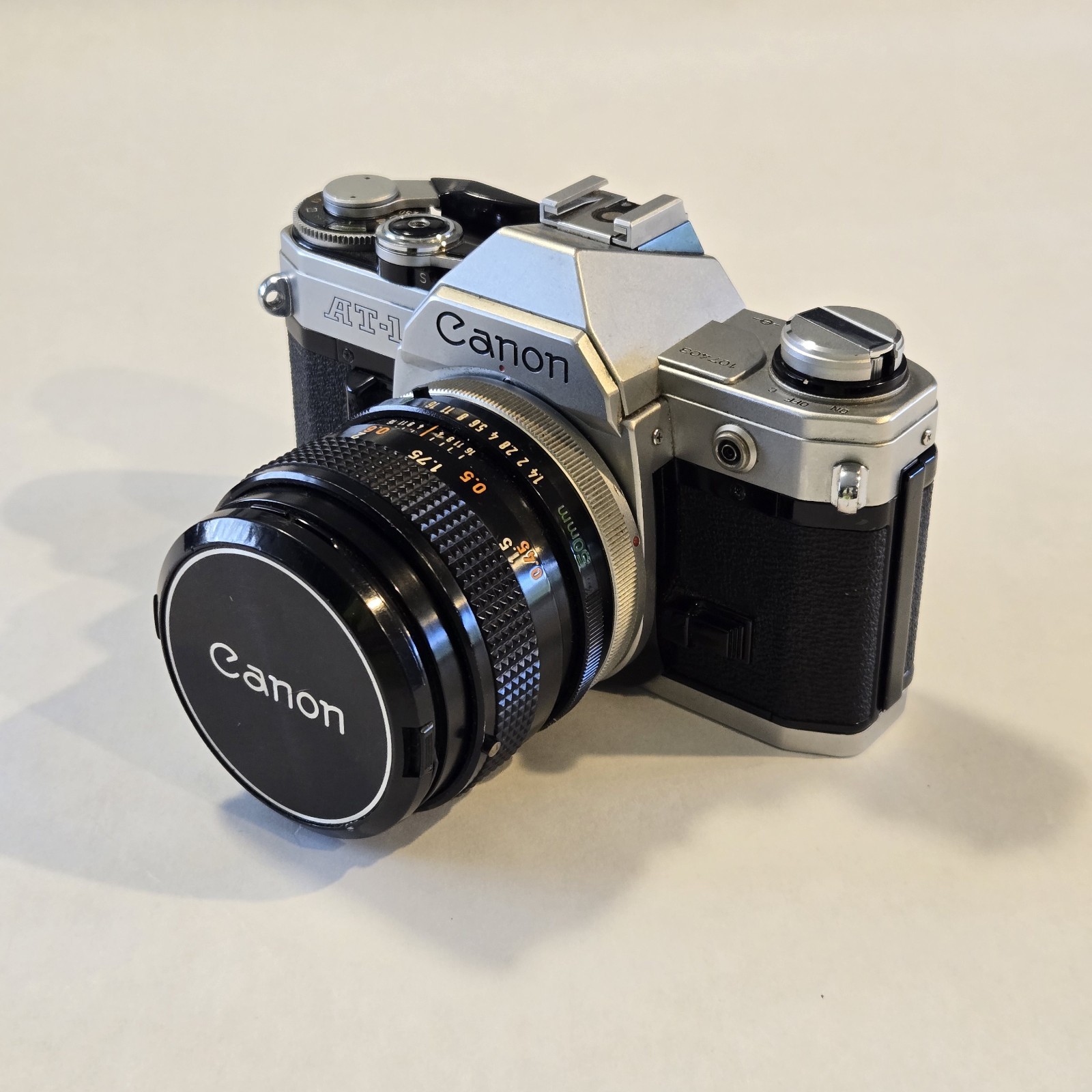 Vintage Canon AT-1 35mm SLR Film Camera w/ Canon FD 50mm f/1.4. Lens Vintage Canon AT-1 35mm SLR Film Camera w/ Canon FD 50mm f/1.4. Lens