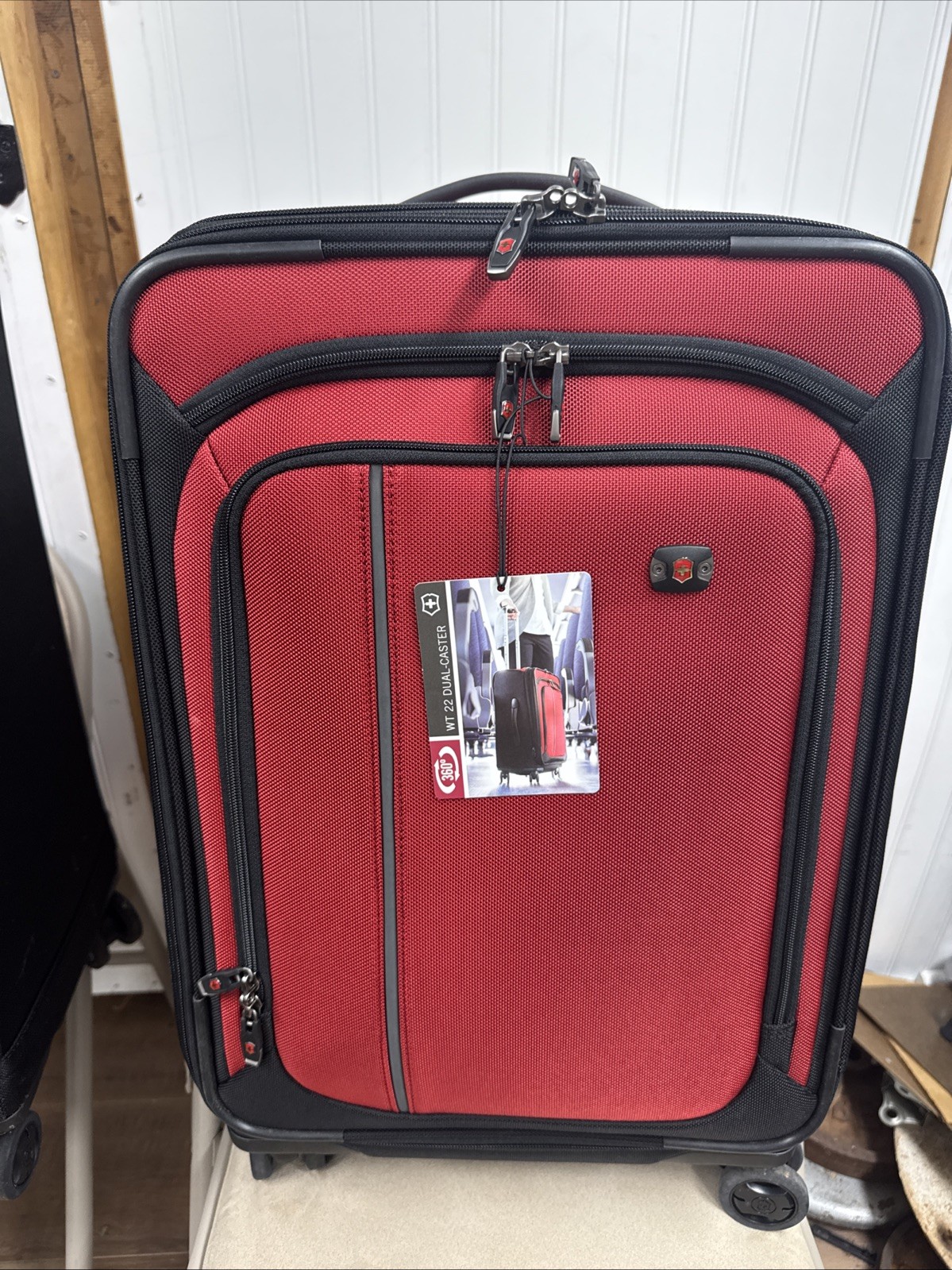 Victorinox Werks Traveler 22” Wheeled Upright Expandable Carry On Suitcase Red Victorinox Werks Traveler 22” Wheeled Upright Expandable Carry On Suitcase Red