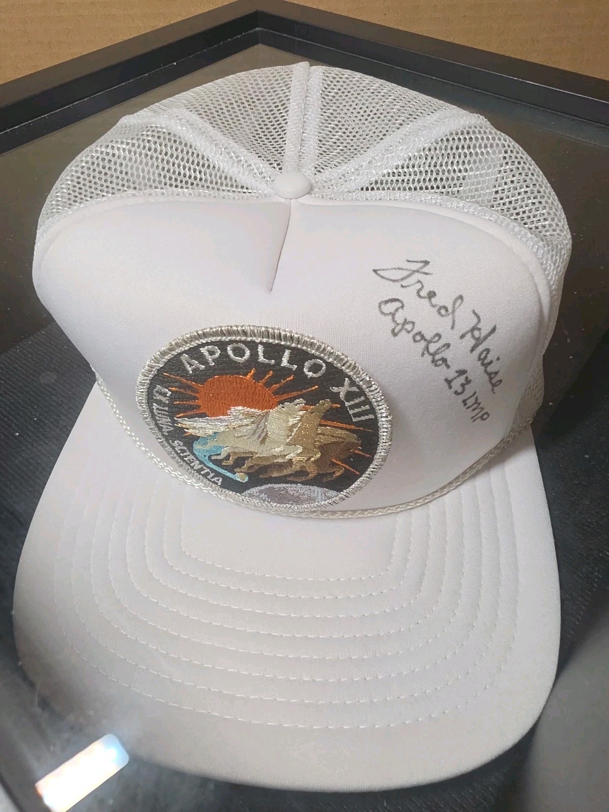 FRED HAISE Autographed Apollo 13 Hat. SIGNED NASA TRUCKER STYLE CAP (FRAMED) FRED HAISE Autographed Apollo 13 Hat. SIGNED NASA TRUCKER STYLE CAP (FRAMED)