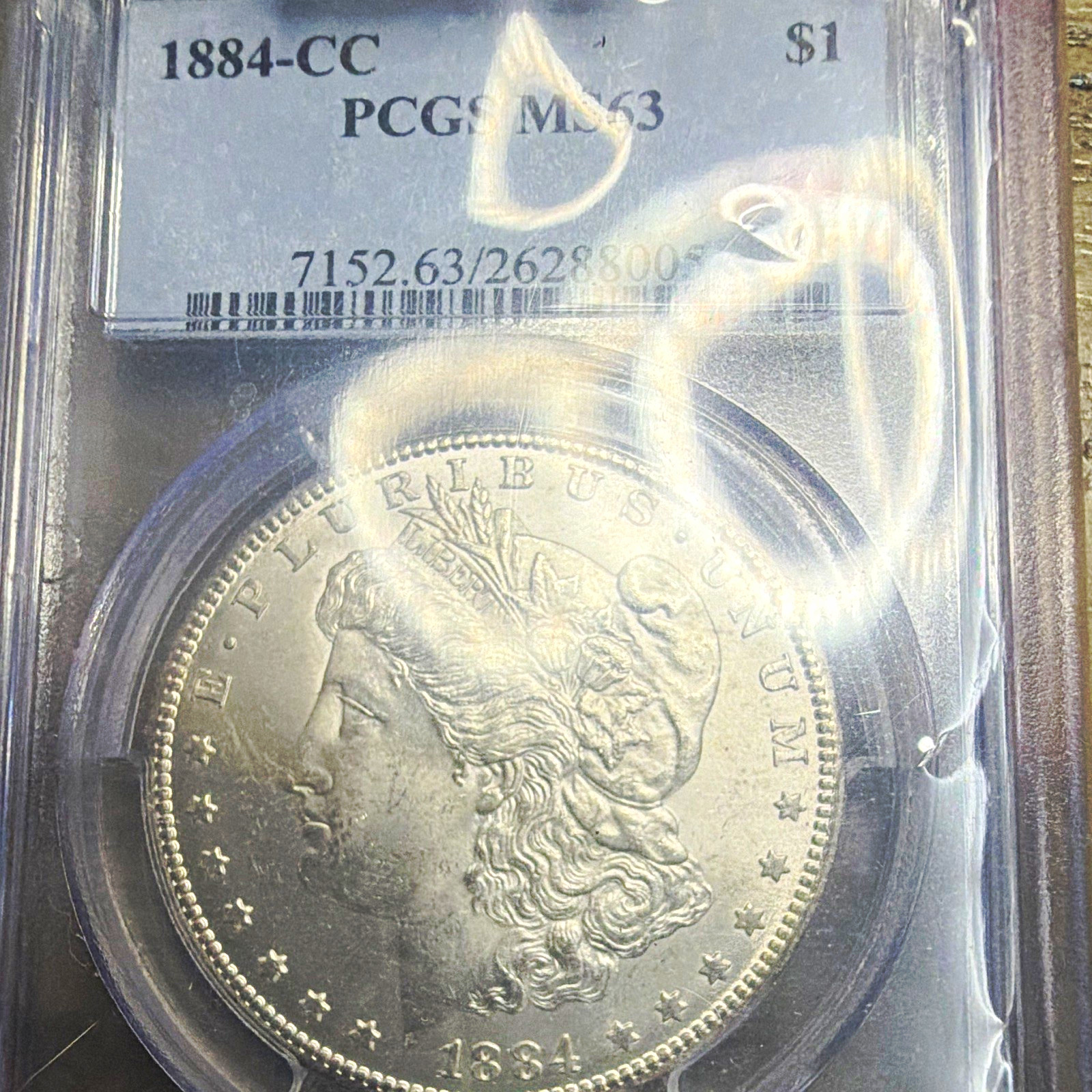 1884-CC Carson City $1 Morgan Silver Dollar • PCGS MS63 • 90% Silver KM#110 1884-CC Carson City $1 Morgan Silver Dollar • PCGS MS63 • 90% Silver KM#110