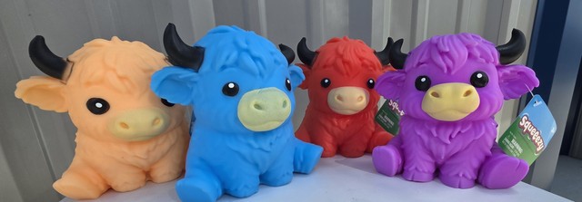 Set of 4 Squeeezy Highland Cow Squishy Fidget Toys Orange Blue Red Purple