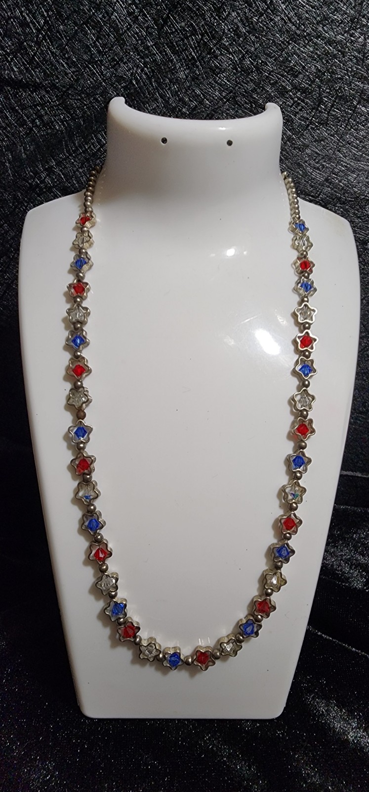 Vintage star necklace with red, white, and blue stones in the center. Vintage star necklace with red, white, and blue stones in the center.