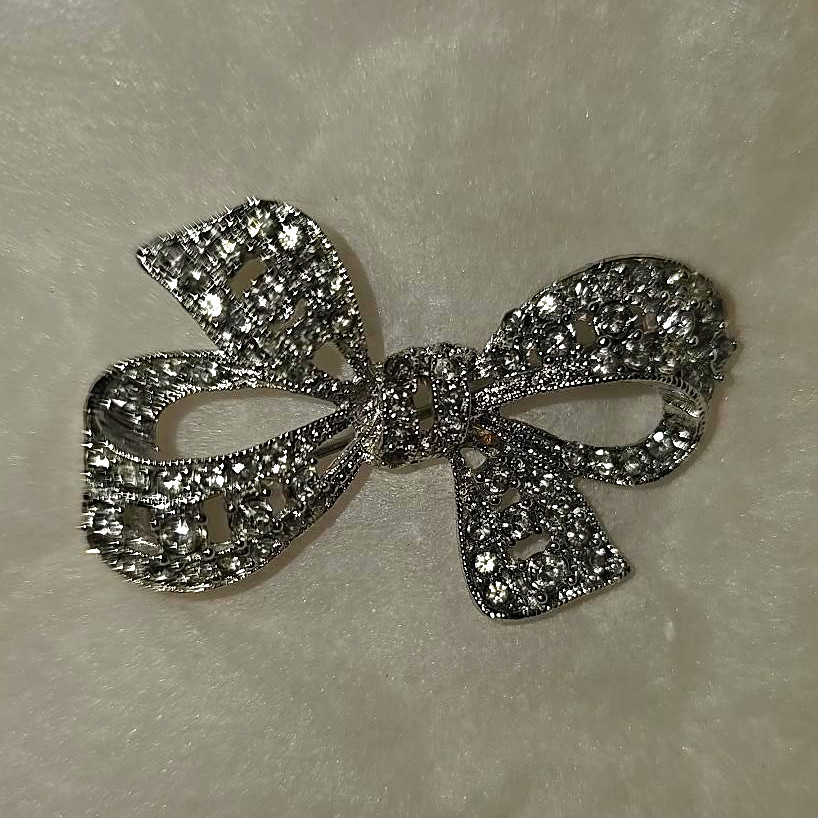 Silver Tone Bow Brooch Pin Rhinestone Crystal Pavé Set Round White Stones Silver Tone Bow Brooch Pin Rhinestone Crystal Pavé Set Round White Stones