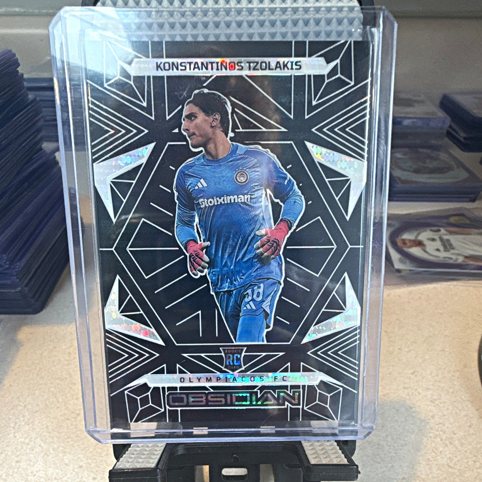 2025-26 Panini Obsidian Soccer - Konstantinos Tzolakis RC 05/11 #133 Olympiacos