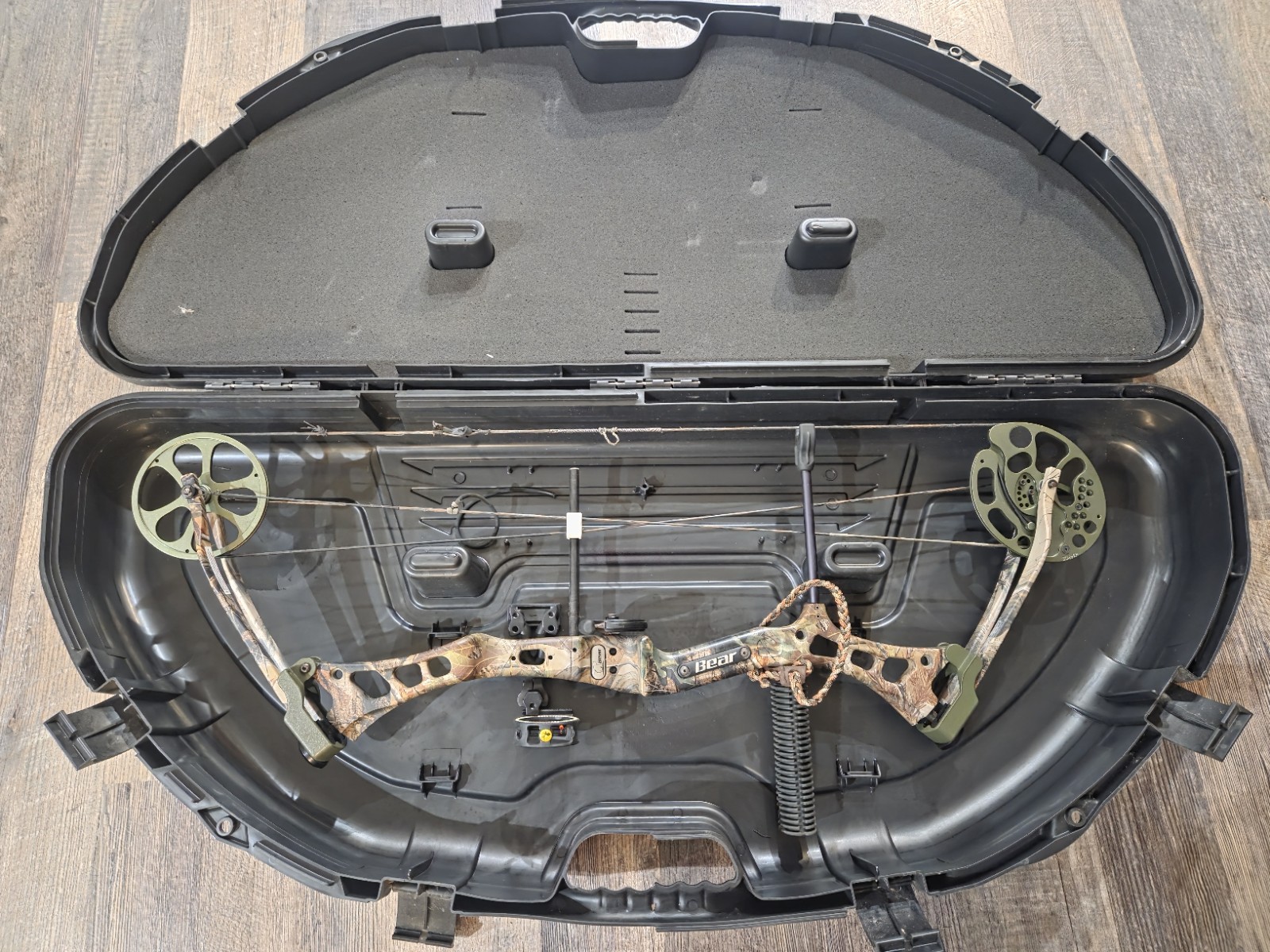 Bear Encounter Camo Right-Handed Compound Bow. Bear Encounter Camo Right-Handed Compound Bow.