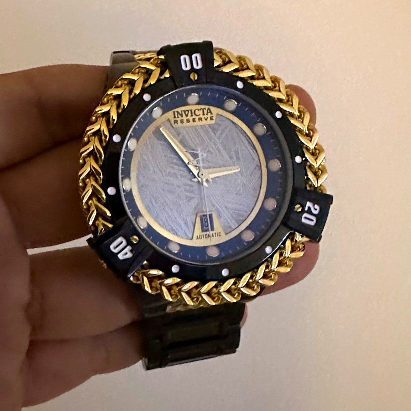 Invicta Reserve Men’s Automatic Date Analog Textured Gold Dial Black/Gold SS Invicta Reserve Men’s Automatic Date Analog Textured Gold Dial Black/Gold SS
