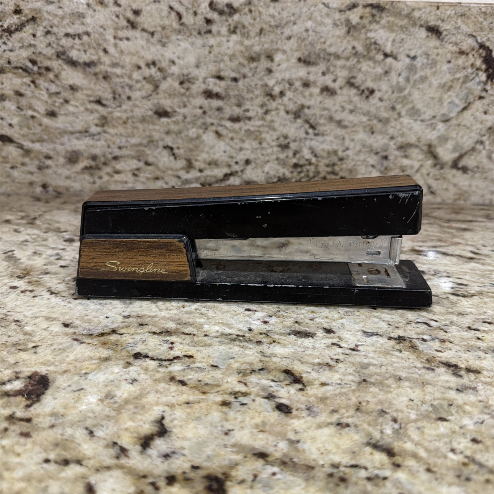 Vintage Woodgrained Swingline Stapler With Top Damage. Vintage Woodgrained Swingline Stapler With Top Damage.