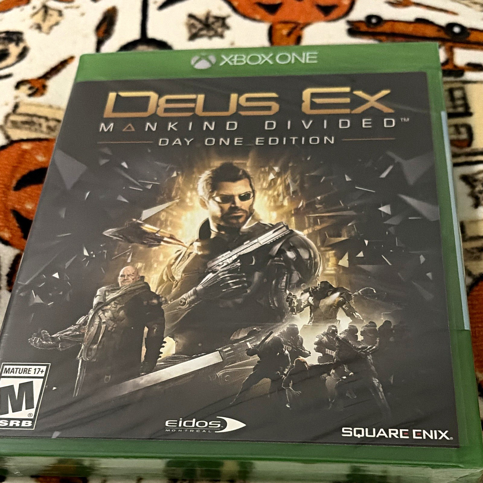 Square Enix Deus Ex: Mankind Divided Day One Edition Xbox One M 2016 NTSC Square Enix Deus Ex: Mankind Divided Day One Edition Xbox One M 2016 NTSC