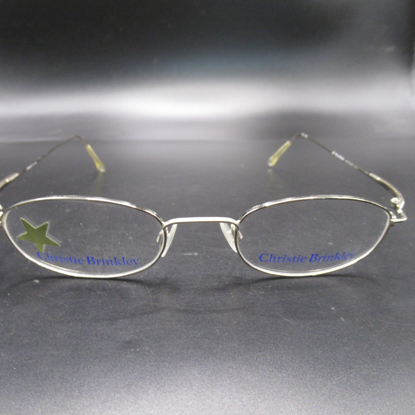 Christie Brinkley Eyeglass Frames Women's Oval Silver Metal Half Rimless Christie Brinkley Eyeglass Frames Women's Oval Silver Metal Half Rimless
