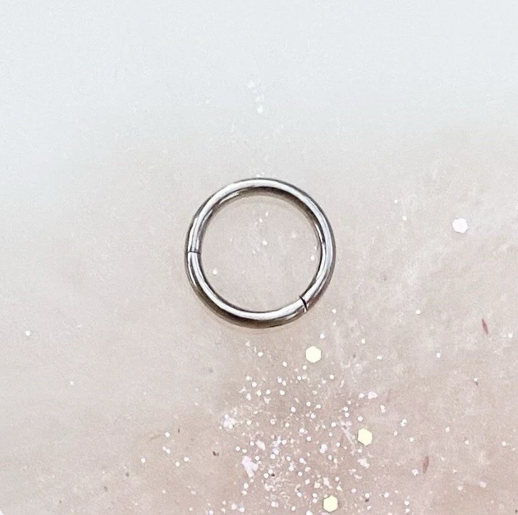 Silver Titanium Clicker Hoop. 20G, 18G, 16G, 14G, 12G, 10G. Silver Titanium Clicker Hoop. 20G, 18G, 16G, 14G, 12G, 10G.