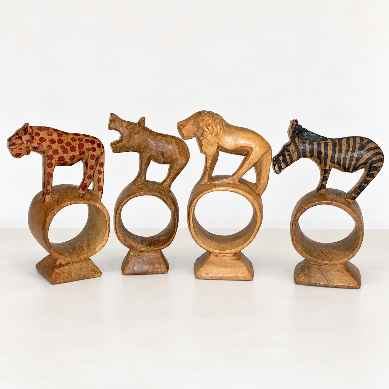 Vintage Kenyan Hand Carved Wood Napkin Rings Set 4 Leopard Rhino Lion Zebra 