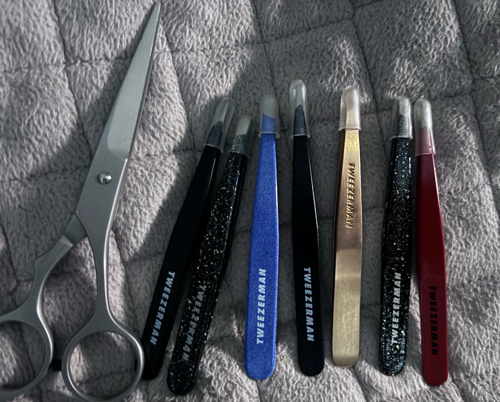 7 Tweezerman Tweezers Available and One Pair Of Scissors $32.99 A Pair Average 7 Tweezerman Tweezers Available and One Pair Of Scissors $32.99 A Pair Average