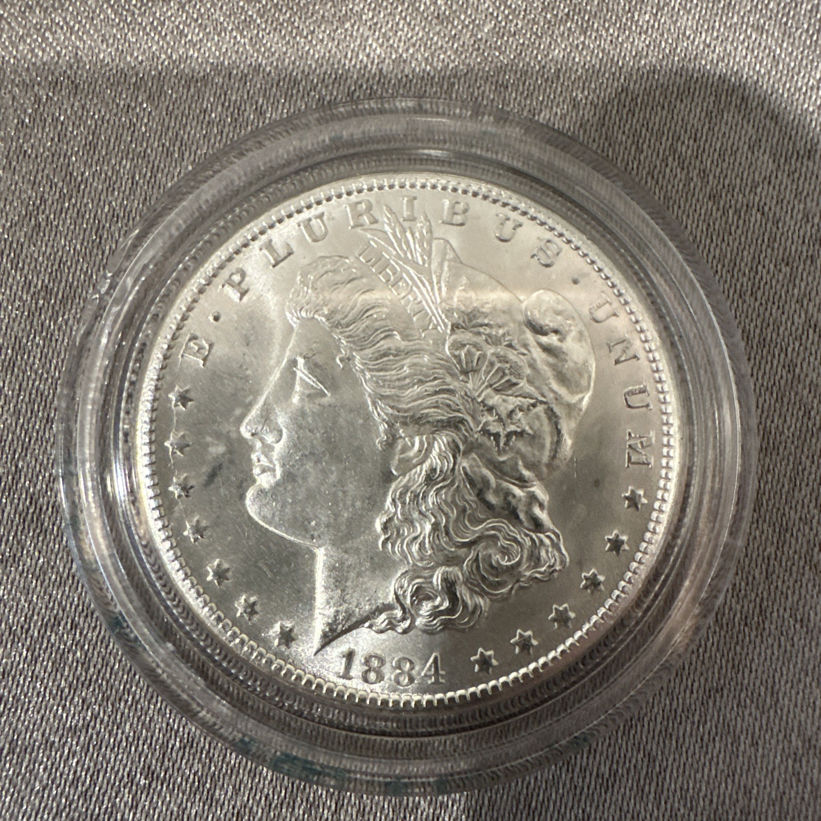 1884 morgan silver dollar carson city AU-58 1884 morgan silver dollar carson city AU-58