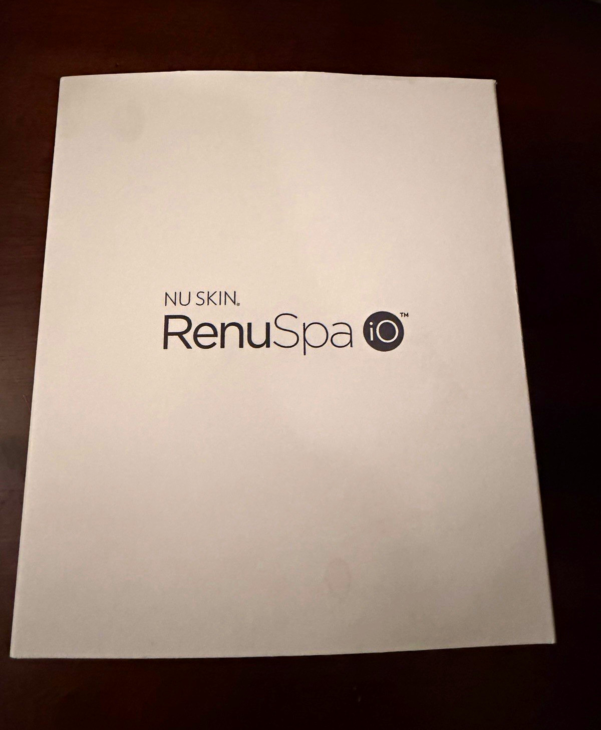 Nu Skin RenuSpa iO Device, wireless charger and conductive gel. Nu Skin RenuSpa iO Device, wireless charger and conductive gel.