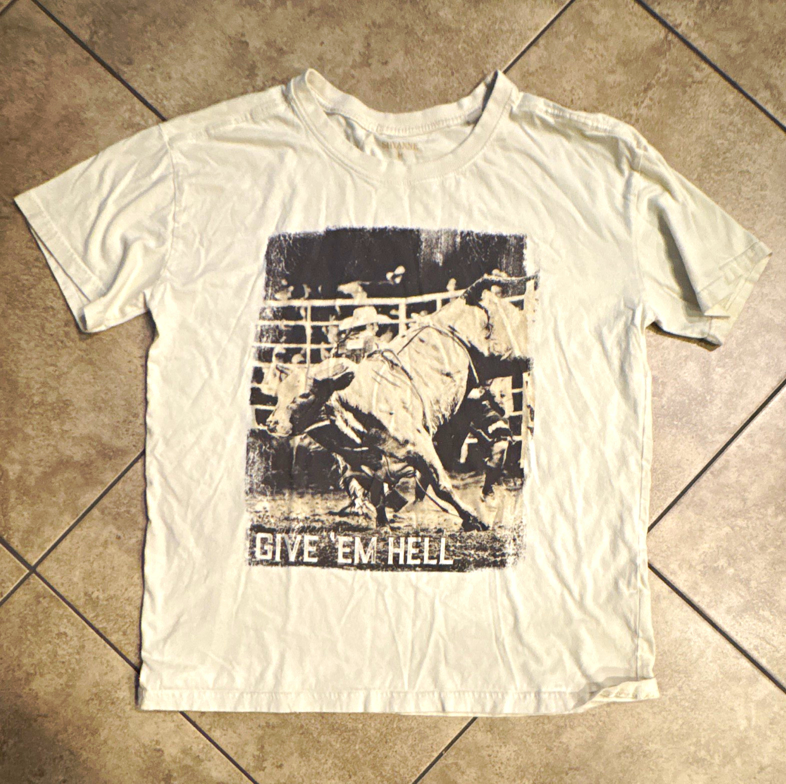 Shyanne Woman’s White Give ’Em Hell Bull Rider Graphic Tee M Crew Neck SS Shyanne Woman’s White Give ’Em Hell Bull Rider Graphic Tee M Crew Neck SS