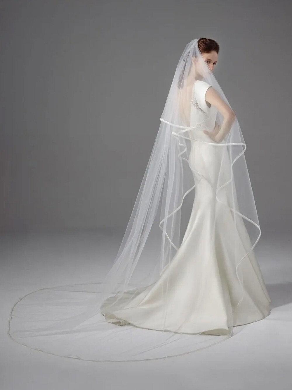 wedding veil chapel length Peter Langer off white with delicate rope trim wedding veil chapel length Peter Langer off white with delicate rope trim
