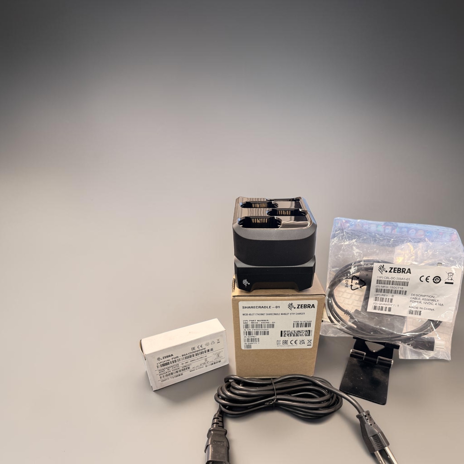 ZEBRA SAC-MC33-4SCHG-01 BATTERY CHARGER KIT (4-SLOT) W/ PS, DC LINE & WIRE AC LI ZEBRA SAC-MC33-4SCHG-01 BATTERY CHARGER KIT (4-SLOT) W/ PS, DC LINE & WIRE AC LI