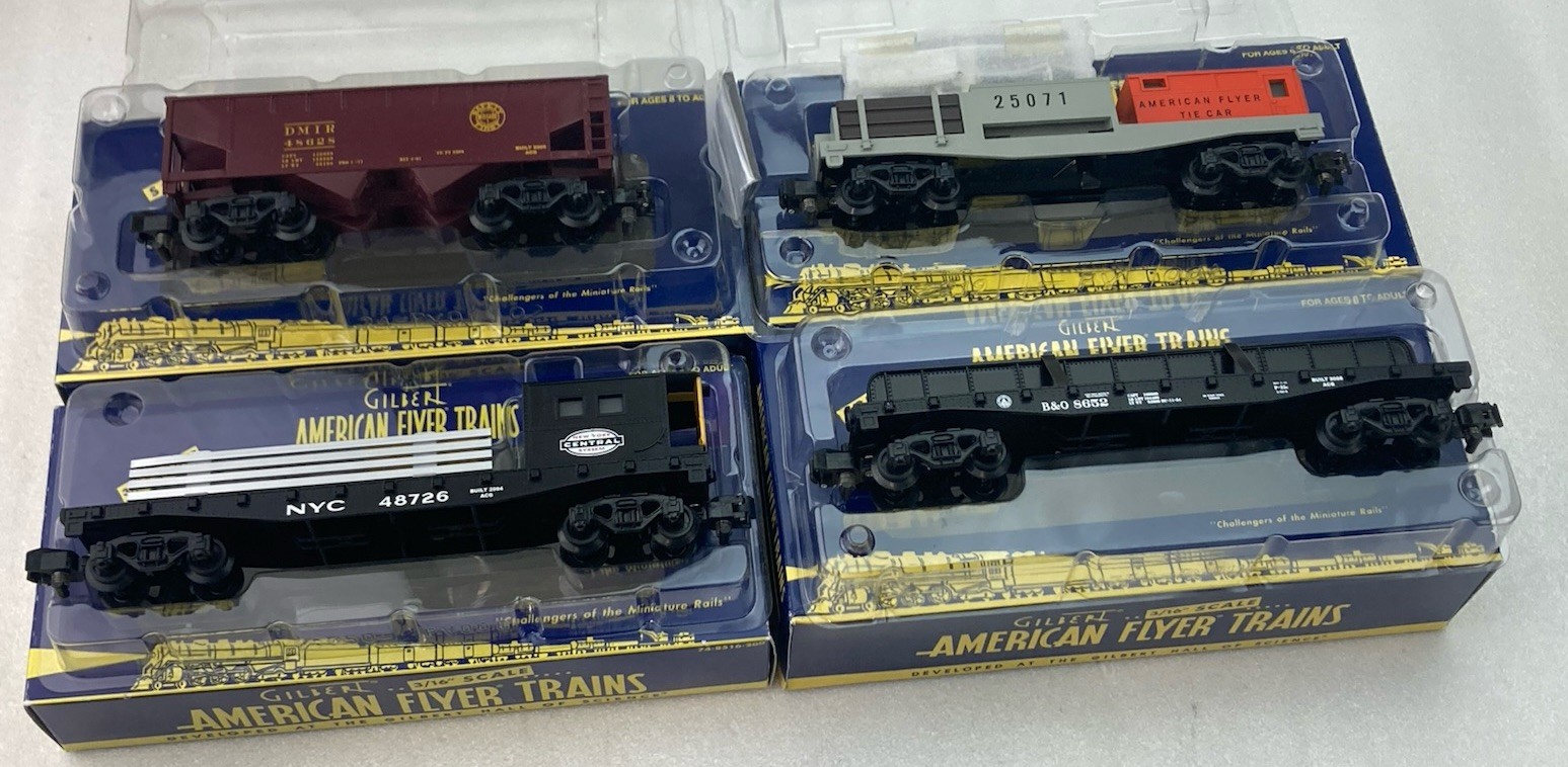 Lot of 4 American Flyer S Gauge Train A/F Tie, Range Hopper, Boom, Flat Cars NEW Lot of 4 American Flyer S Gauge Train A/F Tie, Range Hopper, Boom, Flat Cars NEW