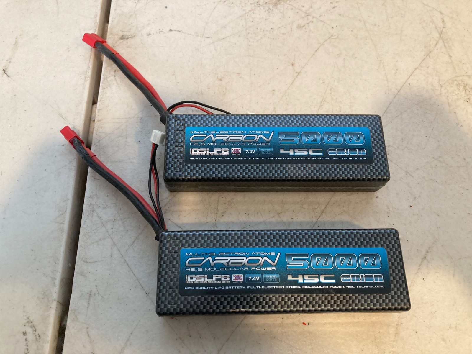 Lot of 2 Team Orion Carbon 5000 45C LiPo Battery 7.4V Multi-Electron Atoms Lot of 2 Team Orion Carbon 5000 45C LiPo Battery 7.4V Multi-Electron Atoms