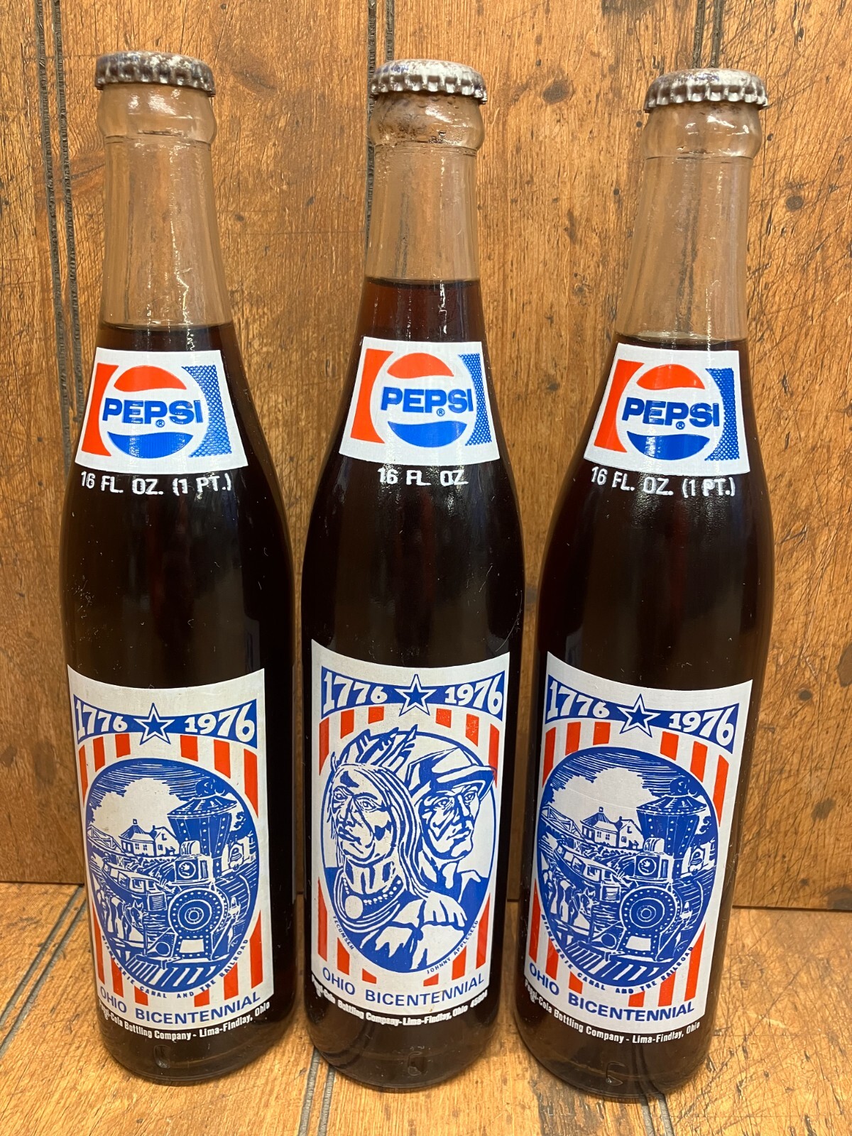 3 Full Pepsi 1776 - 1976 Ohio Bicentennial ACL Bottles 2 Designs Unopened 16 Oz. 3 Full Pepsi 1776 - 1976 Ohio Bicentennial ACL Bottles 2 Designs Unopened 16 Oz.