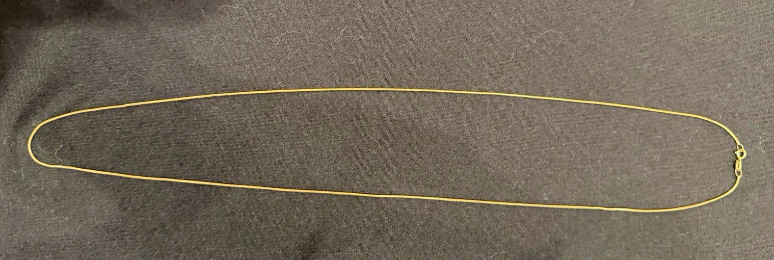 24” Made in Italy 14k gold thin snake chain necklace, lightly worn.