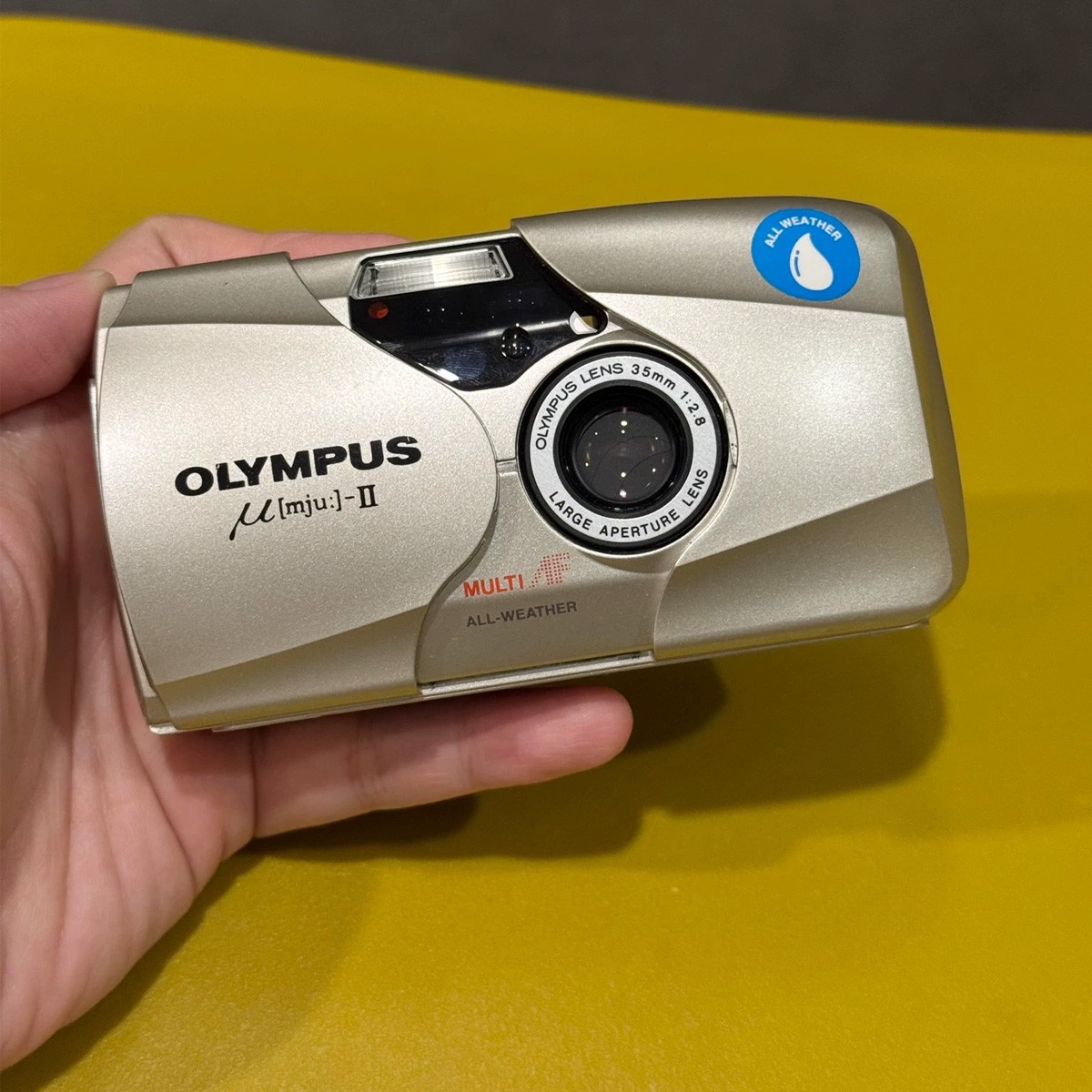 Olympus MJU II Champagne 35 mm Film Camera with 35 mm F2.8 Lens DE English Olympus MJU II Champagne 35 mm Film Camera with 35 mm F2.8 Lens DE English