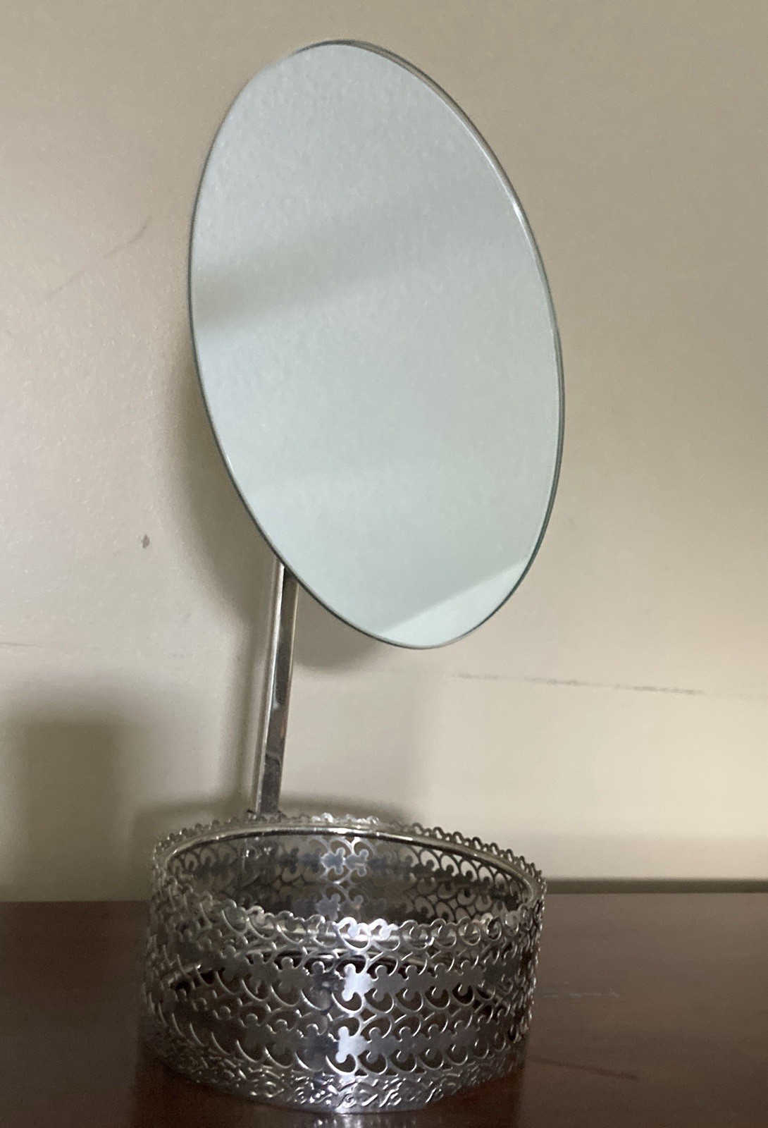 Vintage Silver-Tone Oval Vanity Mirror with an Ornate Filigree Storage Base