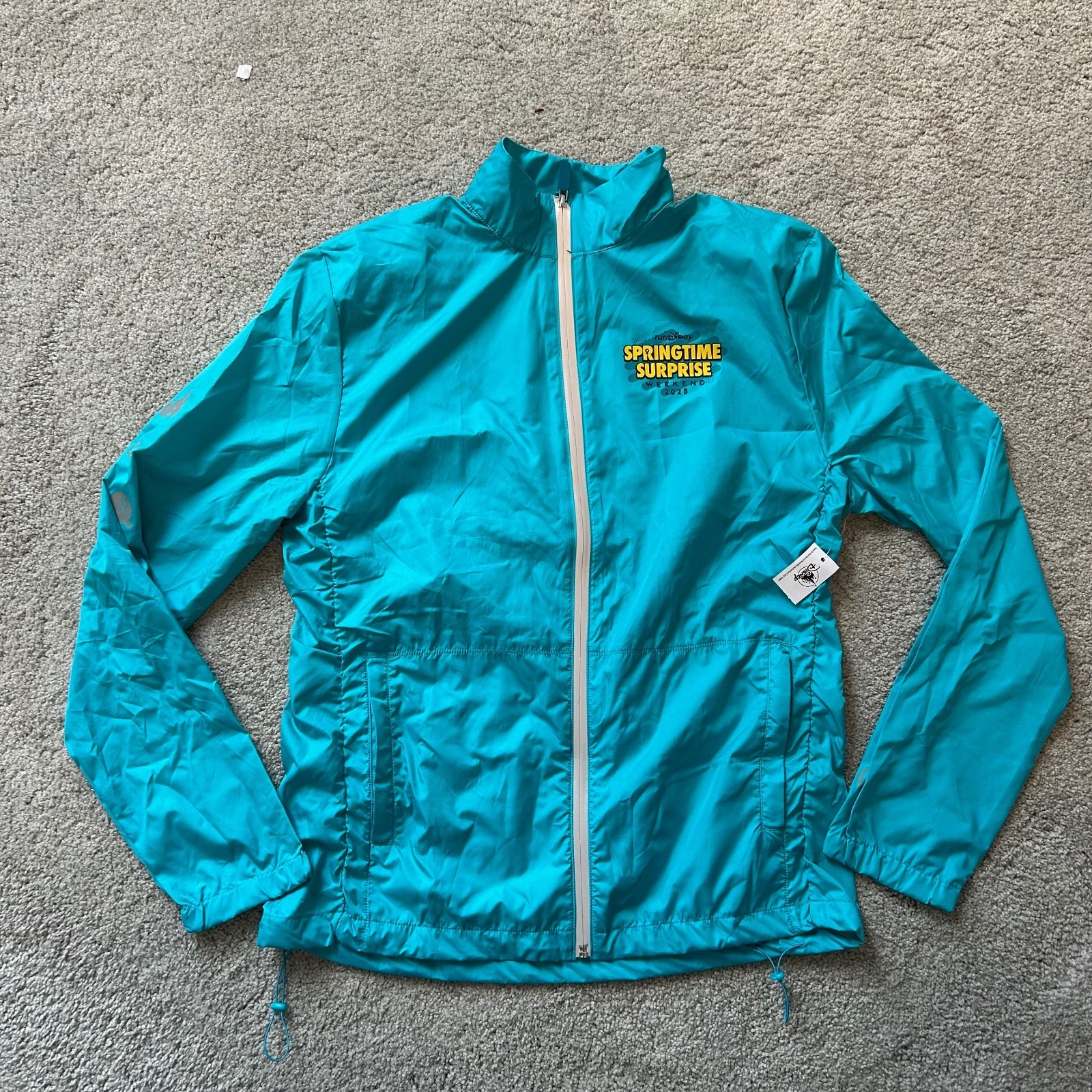 Disney size M RunDisney Springtime Surprise Weekend 2025 Windbreaker NWT Disney size M RunDisney Springtime Surprise Weekend 2025 Windbreaker NWT