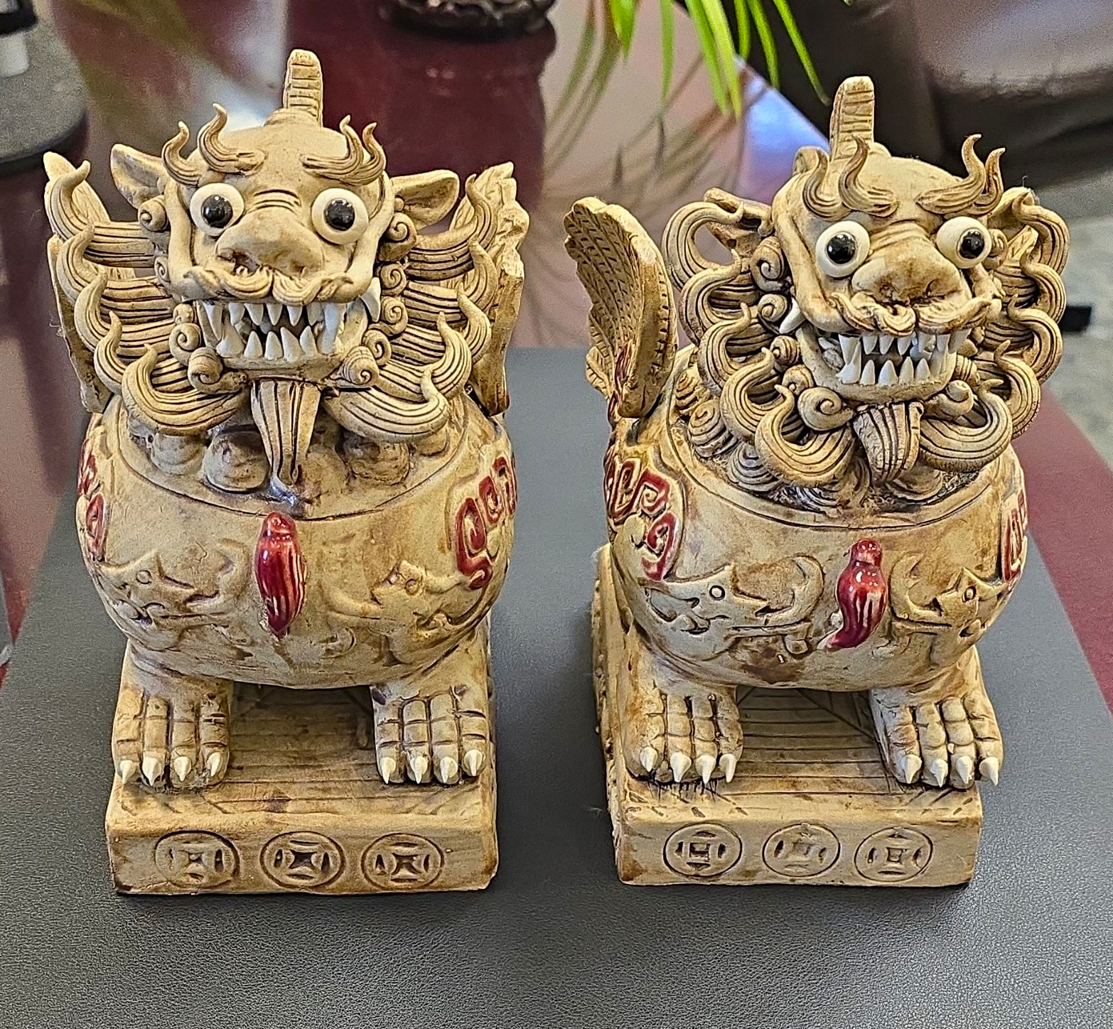 Pair of Chinese Ceramic Foo Dog Guardian Lion Statues Beige Red Accents Pair of Chinese Ceramic Foo Dog Guardian Lion Statues Beige Red Accents