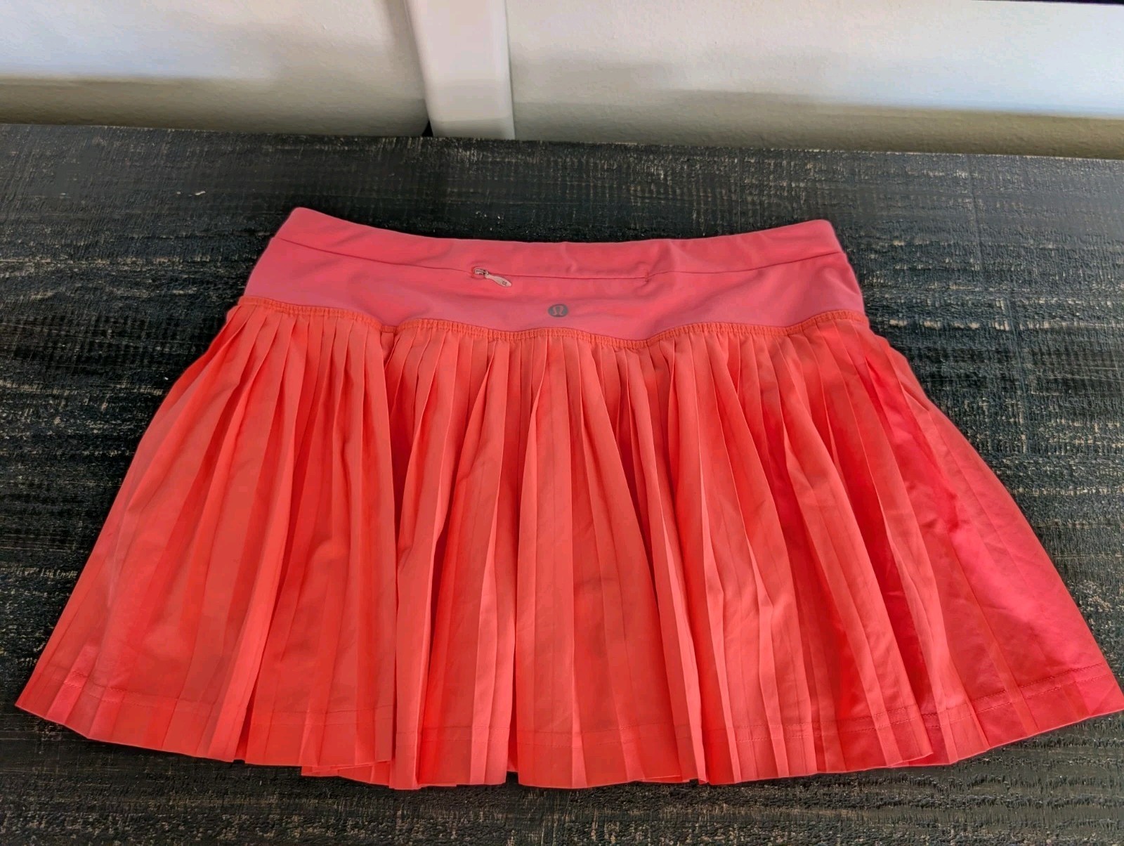 Lululemon Athletica Pleat to Street Skirt II in the color Grapefruit Size 6 RARE