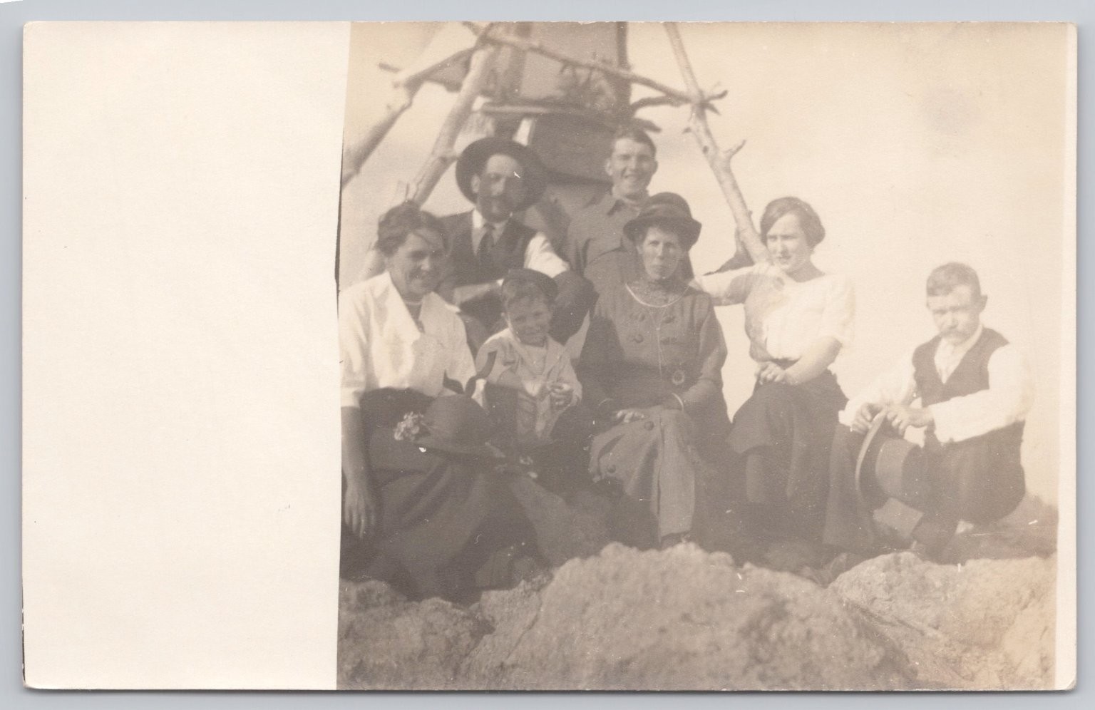 Vintage RPPC Postcard Group of 7 People Outdoors Wooden Structure c. 1910s AZO