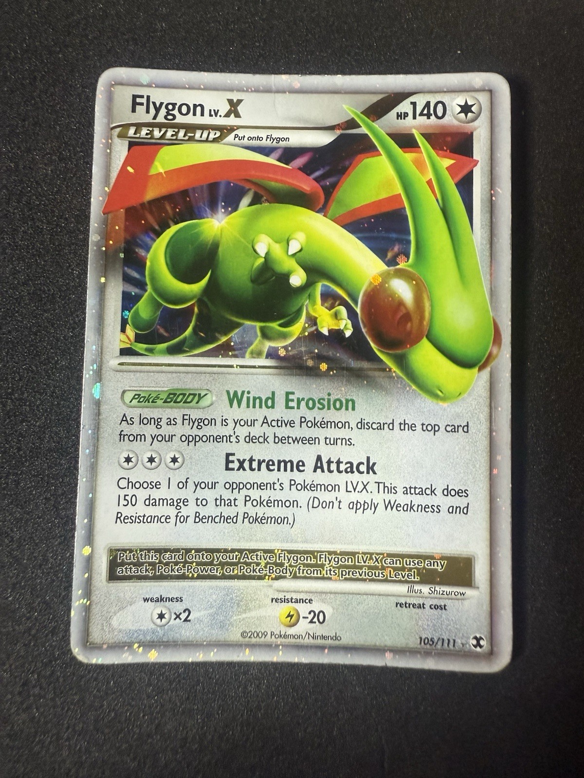 The Pokémon Company Flygon LV.X 105/111 Rising Rivals Holo HP EN The Pokémon Company Flygon LV.X 105/111 Rising Rivals Holo HP EN