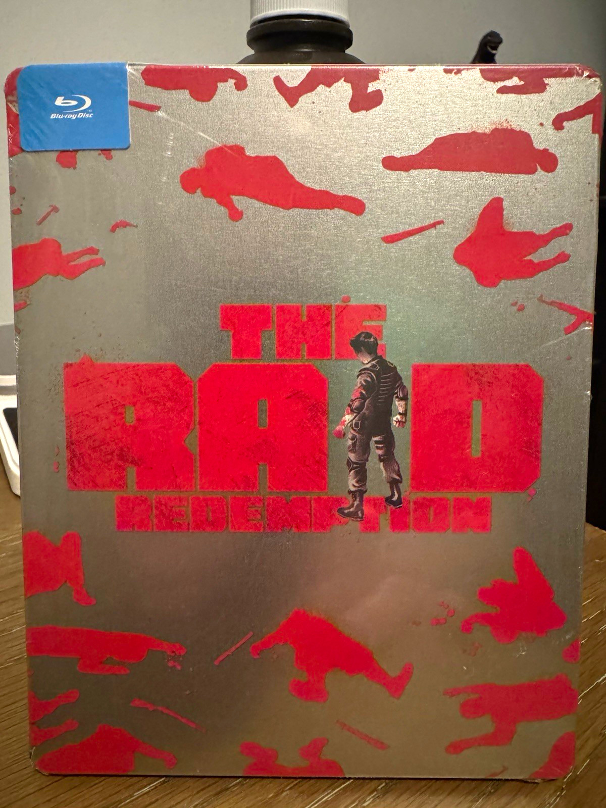 The Raid Redemption - Blu Ray - SEALED - some wear on plastic and on Steelbook The Raid Redemption - Blu Ray - SEALED - some wear on plastic and on Steelbook