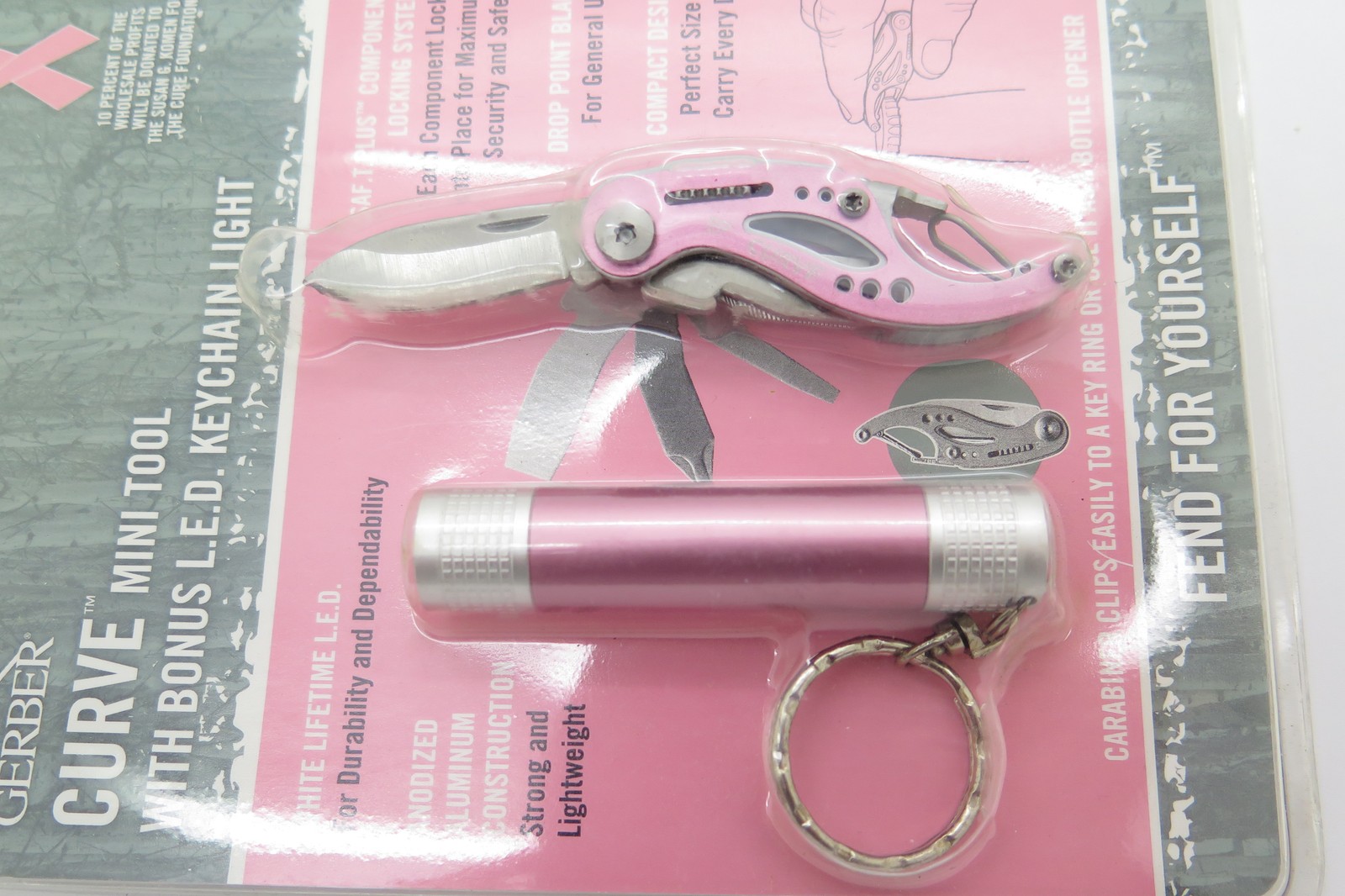 Gerber Curve Pink Breast Cancer Multi Tool Folding Pocket Knife & Flashlight Gerber Curve Pink Breast Cancer Multi Tool Folding Pocket Knife & Flashlight